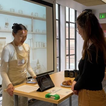 Roleplaying — a team member acting as the barista.
